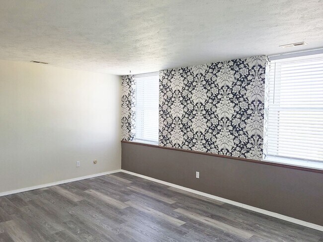 Building Photo - Welcome to Francis Villas — A Home as Uniq...