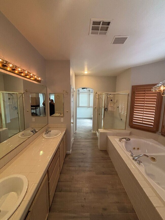 Building Photo - Gated Green Valley Ranch Townhome | 2 Bed | 2.5 Bath | 2-Car Garage