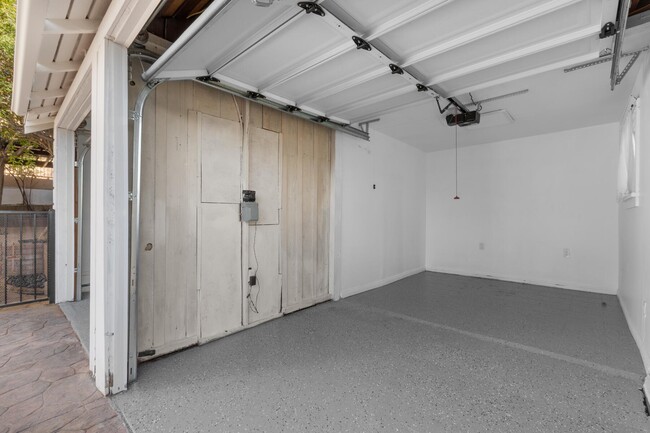 Garage - epoxy floors & Tesla charger - 2442 W Sunset Blvd