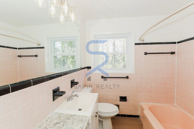 Building Photo - Move in before February 15th and choose your reward: a $250 Amazon Gift Card or a 55" Smart TV!