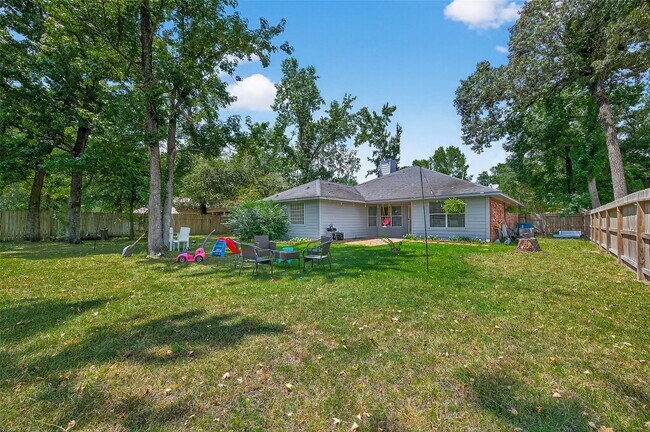 Building Photo - 6719 Woodland Oaks