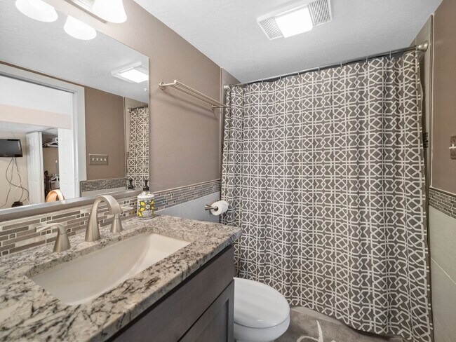 Building Photo - Spacious 2-Bedroom Home with Private Deck,...