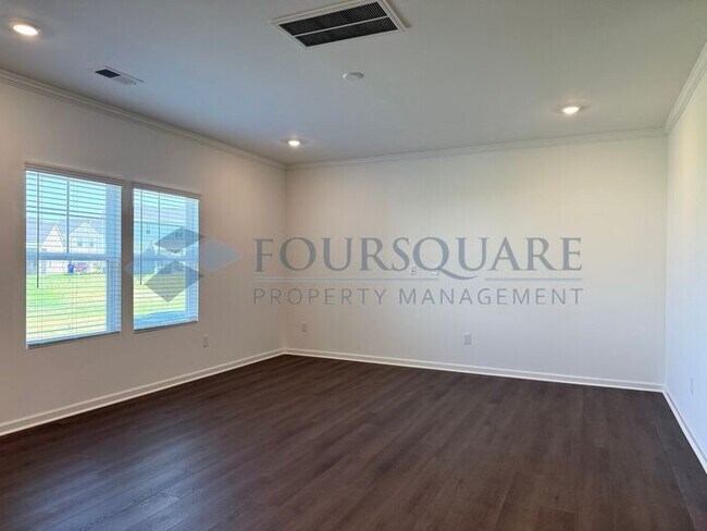 Building Photo - Spacious 4-Bed Home with Flex Room, Loft, Screened Porch & 2-Car Garage – Convenient to Angier an...