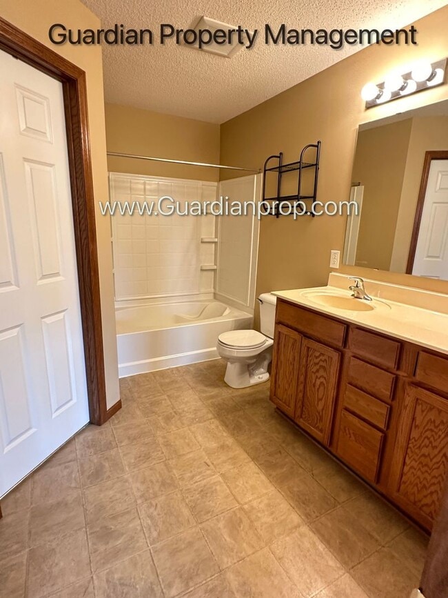 Building Photo - Pet Free Champlin Town Home, 3.5 Baths, 2 Car Garage, Dishwasher, Balcony, Available end of April