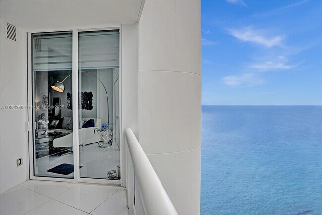Building Photo - 18201 Collins Ave