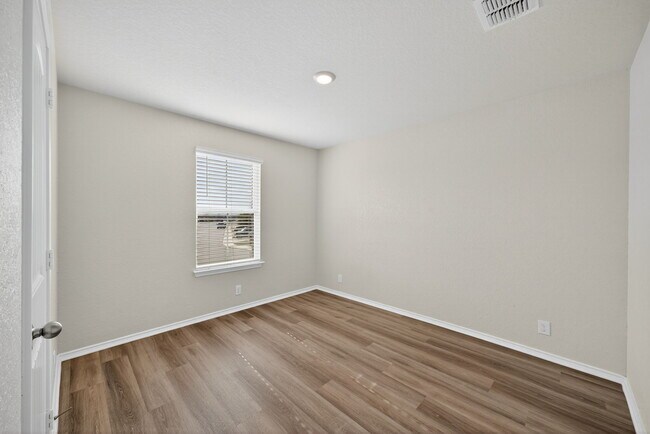 Building Photo - 8203 Rocky Pebble