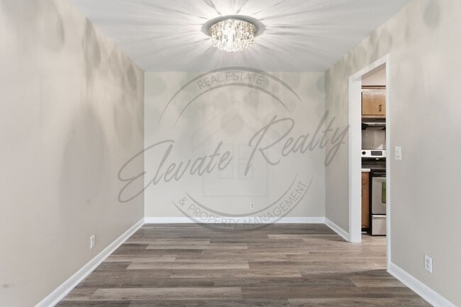 Building Photo - SPRING SPECIAL!! FIRST MONTH FREE on this Two Bedroom Condo, Garden Level with Washer/Dryer Hook ...