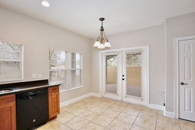 Building Photo - AGENT SHOWINGS ONLY! Stunning 3/2.5 Corner Unit Townhome with a Spacious 2 Car Garage in the Gate...