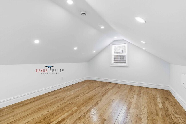 Building Photo - 21-28-28 48th St