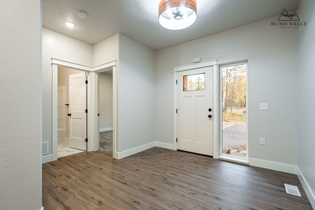 Building Photo - 7472 N Paw St