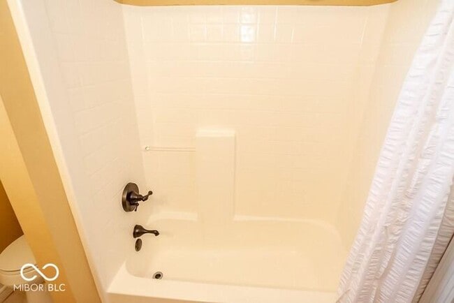 Building Photo - Sweet Spacious Townhome With Finished Base...
