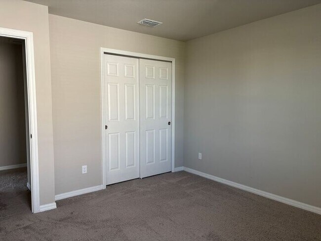 Building Photo - Like-New 4 Bedroom 3 Bath with Pond View & Two Living Spaces — Minutes to South Lake Nona
