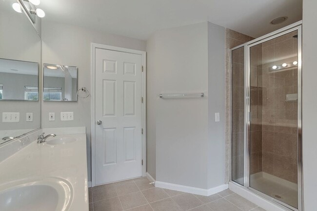 Building Photo - COMING SOON - Great 4 level end unit TH in...