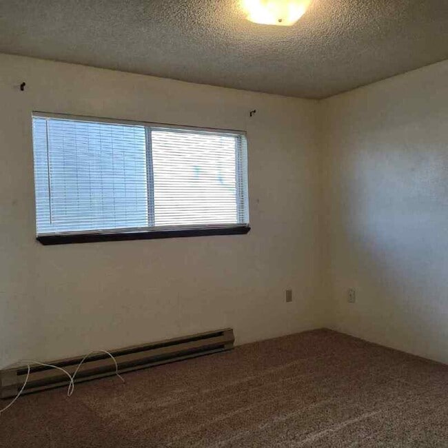 Building Photo - 303 NW Tumlin Ave