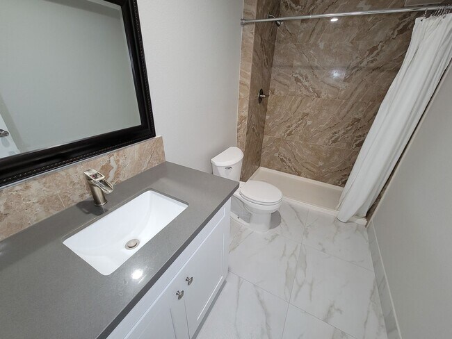 Building Photo - Escape to your updated 3-bed, 2-bath oasis in Goodrich, TX, featuring modern finishes, an open la...