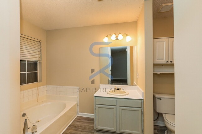 Building Photo - Move in before December 15th and choose your reward: a $250 Amazon Gift Card or a 55" Smart TV!