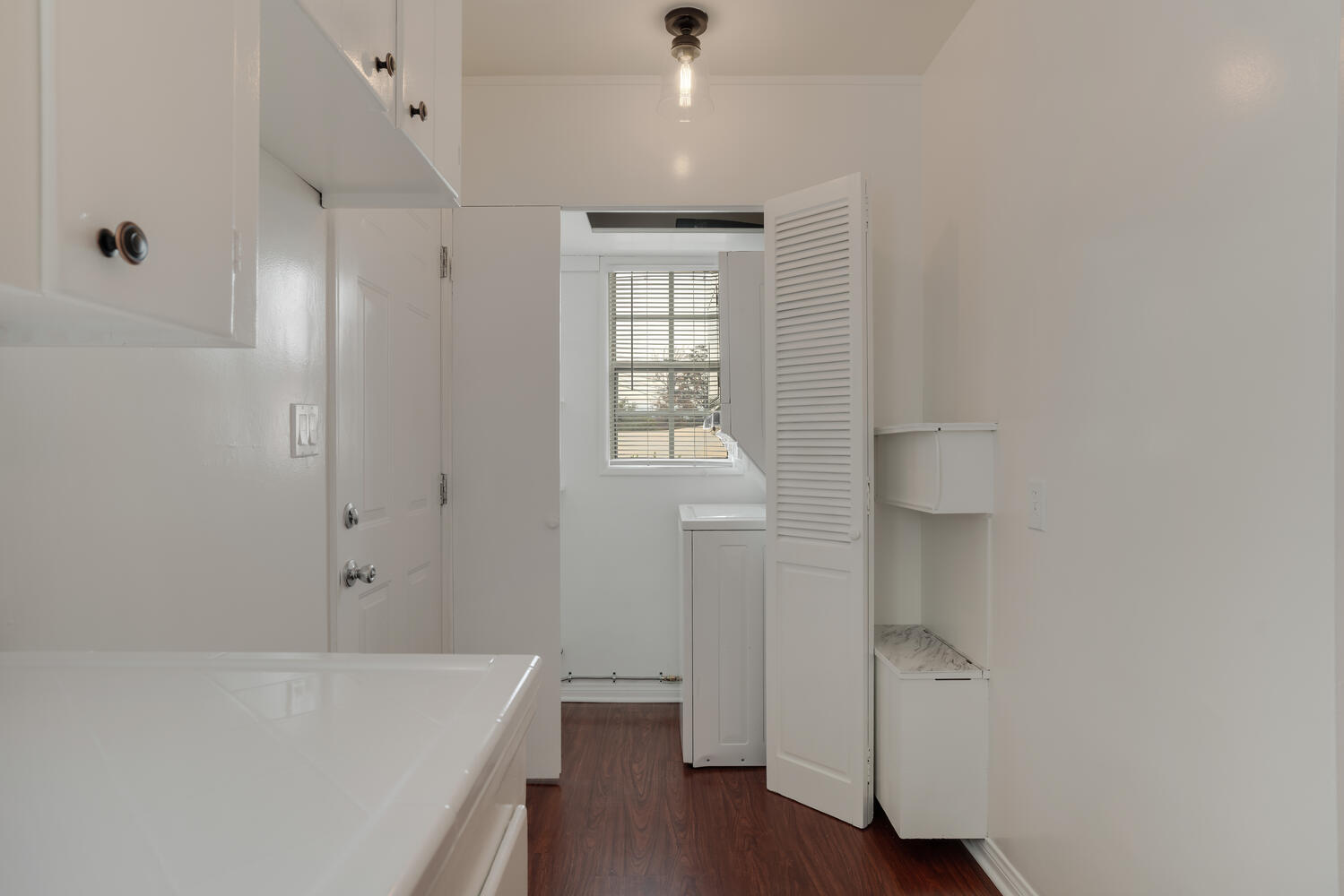 laundry room / mud room off the door area - 5534 Kester Ave