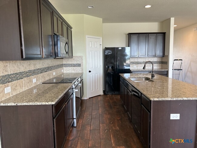Building Photo - 8902 Bowfield Dr