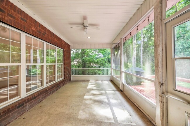 Building Photo - Stunning all-brick home on a large wooded lot
