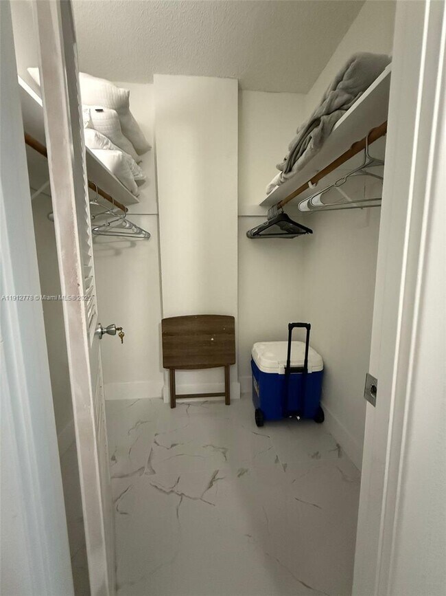 Building Photo - 19380 Collins Ave