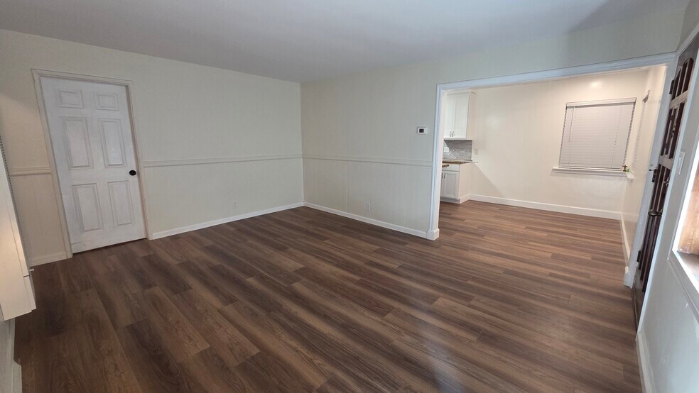 Living Room - view towards dining area - 16825 S Berendo Ave