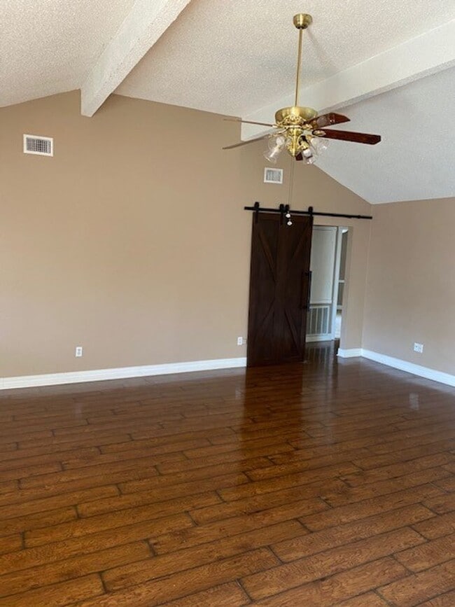 Building Photo - Lovely well cared for home on an extensive landscaped corner lot! Spacious family room with high ...