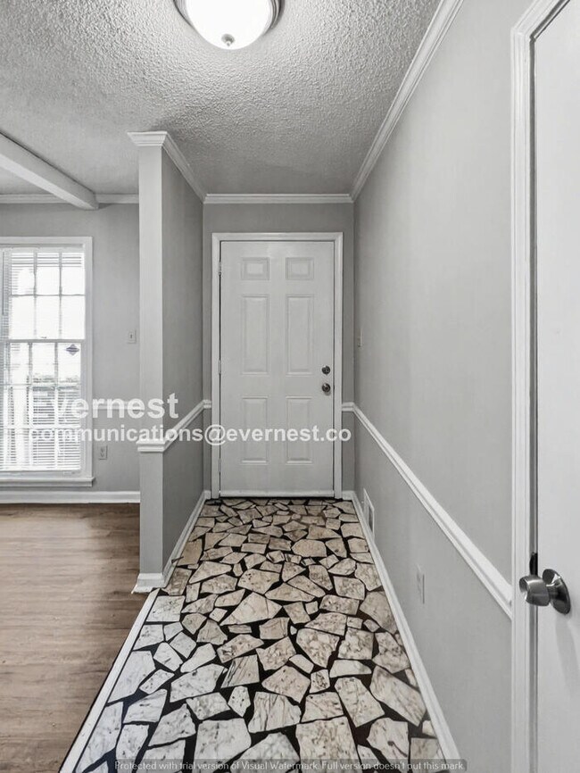 Building Photo - Limited Time Special Offer! / 4 Bed, 2 Bath Home with Carport / Pet-Friendly / Available Now!