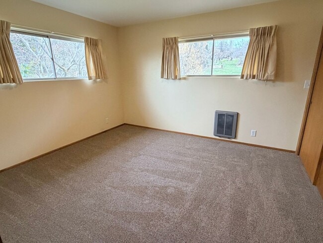 Building Photo - Country like setting! Spacious 3+ bed/ 1.5 bath house with garage, large yard, private deck and a...