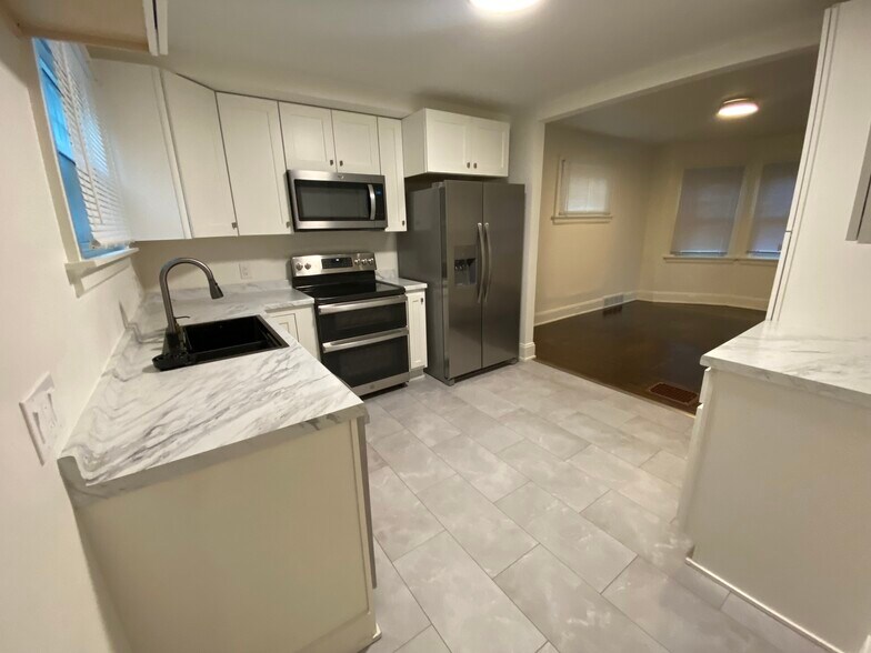 stainless steel: refrigerator, double oven, microwave, dishwasher - 3375 Orion Ave