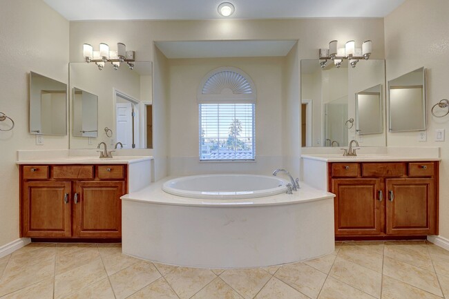 Building Photo - 5 Bedroom Corner Lot Home in Gated Community!