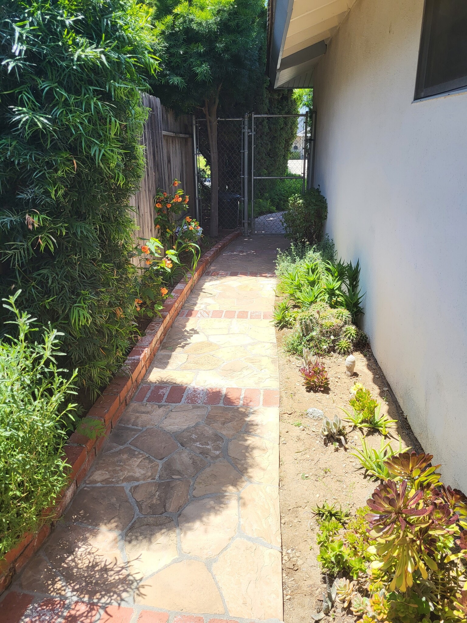 Side yard entrance - 5182 Jay St