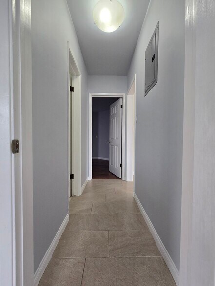 Hallway to Bedroom #2 - 14510 Placid Dr