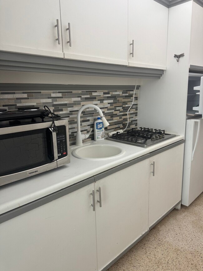 Building Photo - 6490 Collins Ave