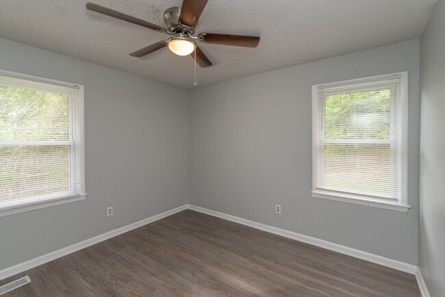 Building Photo - Freshly Updated 3BR with New LVP Flooring, Energy-Efficient Windows & Spacious Fenced Backyard