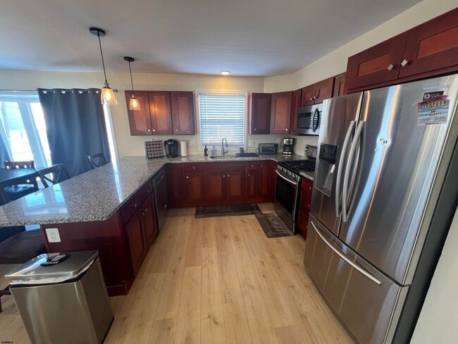 Building Photo - 239 N Derby Ave