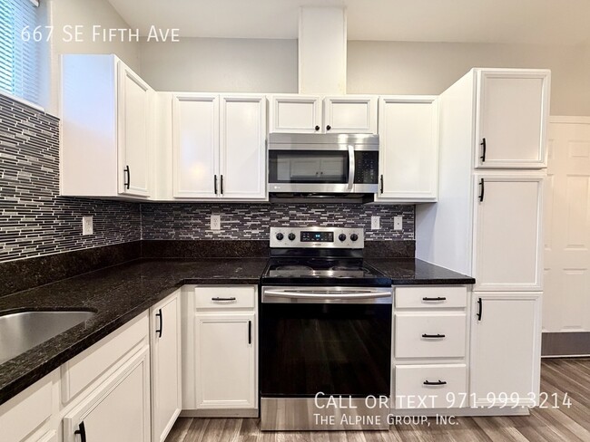 Building Photo - 667 SE Fifth Ave-