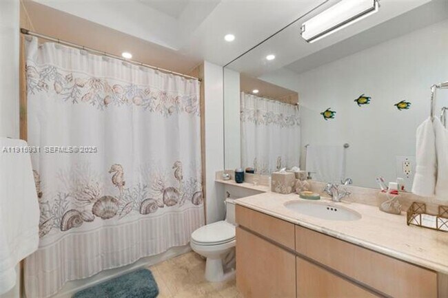 Building Photo - 18671 Collins Ave