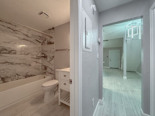 Building Photo - MODERN! Walk to FSU 2/2 w/ Marble Counters, Stainless Steel Appliances, & Privacy Fenced Yard! Av...