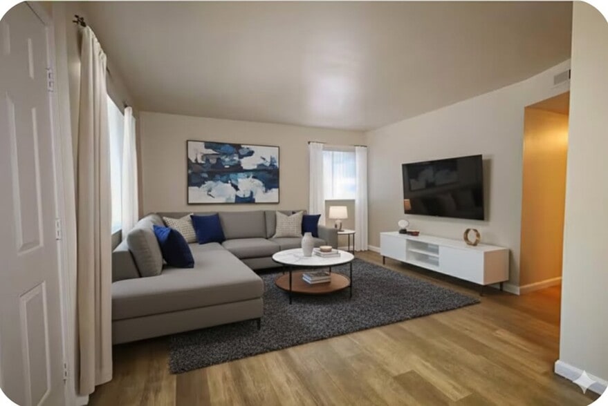 Living room- staged - Summer Village Apartments