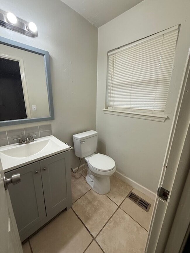 Building Photo - 3 bedrooms - 1.5 baths - Wood-look Floors ...