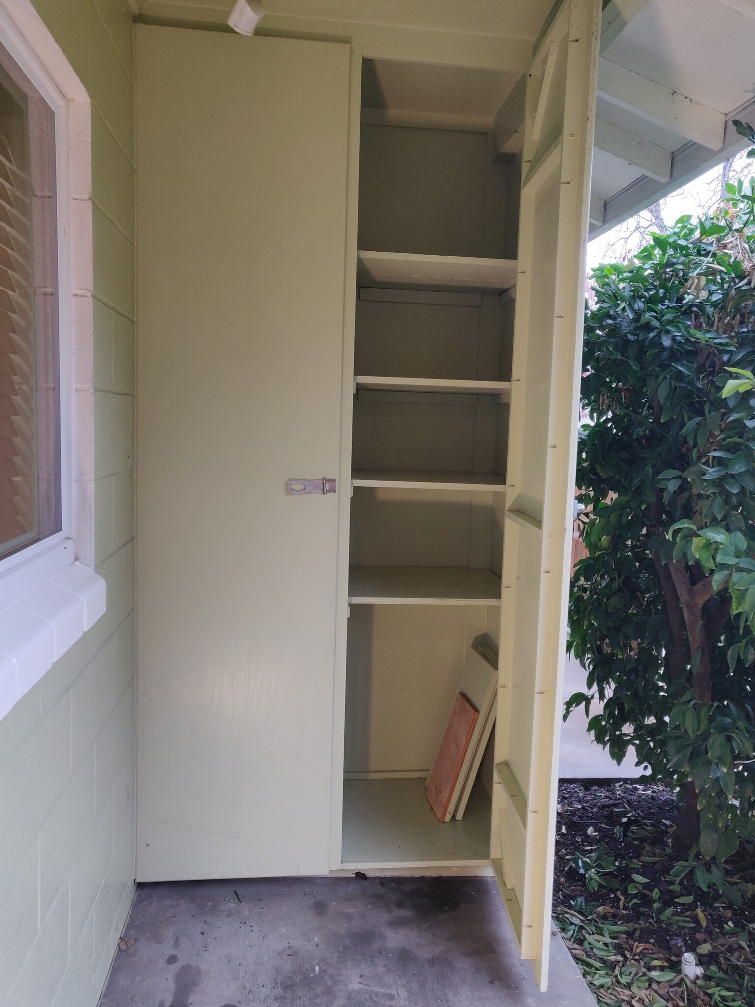 Storage cupboard on porch. - 1130 Olive St