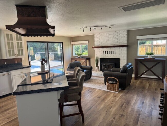 Building Photo - Stunning Deck and Pool for this Updated Mi...