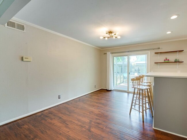 Building Photo - Check out this amazingly located 3 bed/2 b...