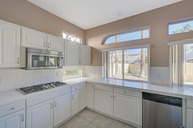 Building Photo - Stunning Green Valley home with a pool in guard gated Legacy