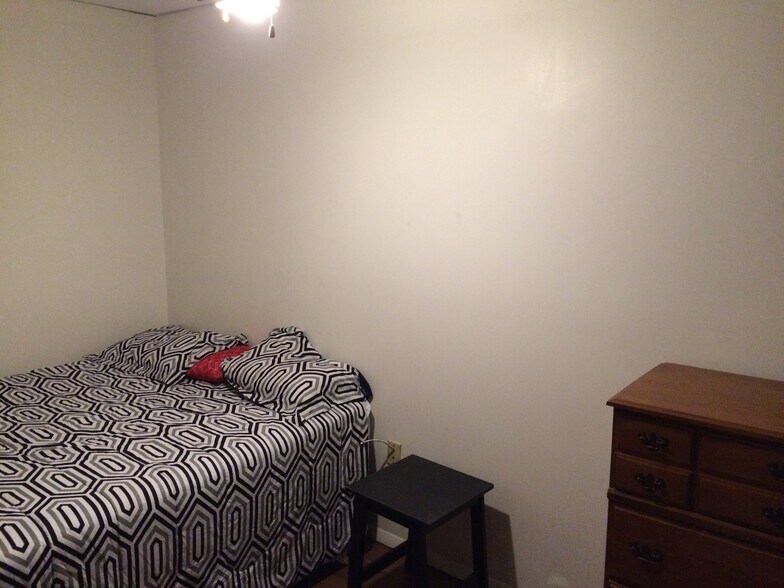 Cozy queen-size bed. Also has a ceiling fan. - 539 Blaine Avenue