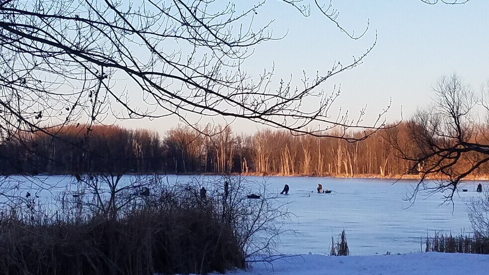 ICE FISHERMEN ENJOY THE LAKE - 232 N Lake St SE