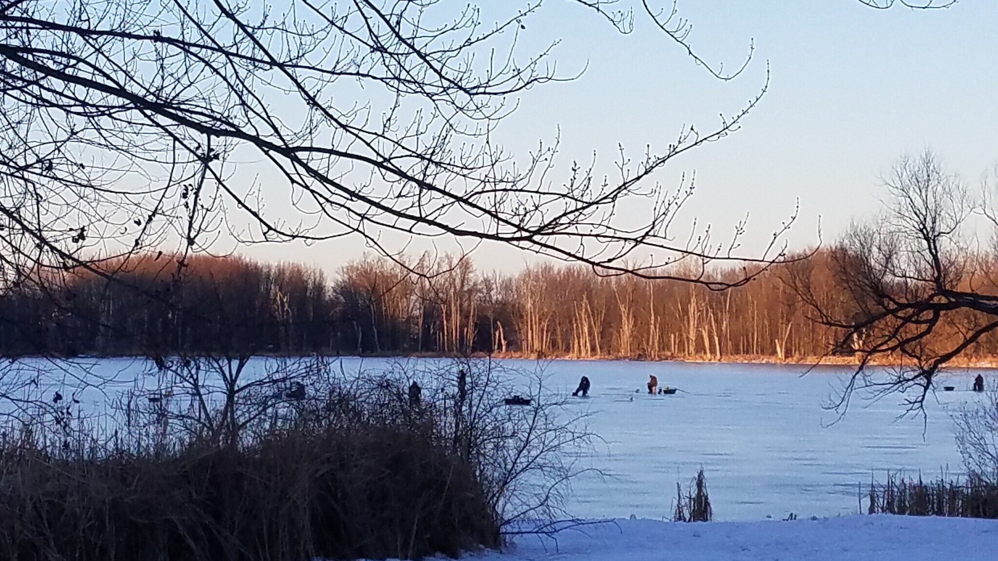 ICE FISHERMEN ENJOY THE LAKE - 232 N Lake St SE
