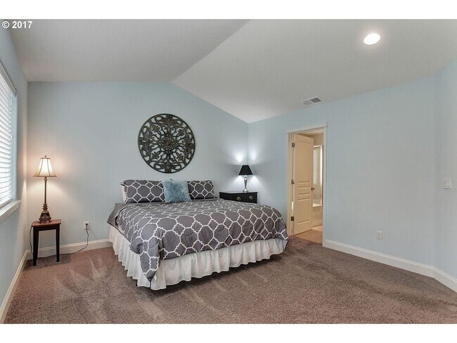 Building Photo - Bright and Open Floor Plan with Fireplace, Attached Garage & Vaulted Ceilings
