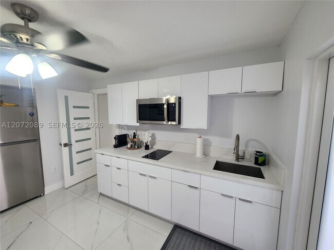 Building Photo - 98XX NW 122nd St