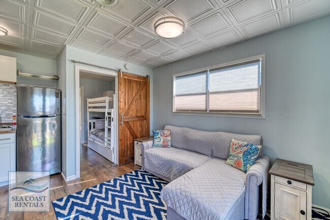 Building Photo - Beach Please @ 218 Sandpiper Dr